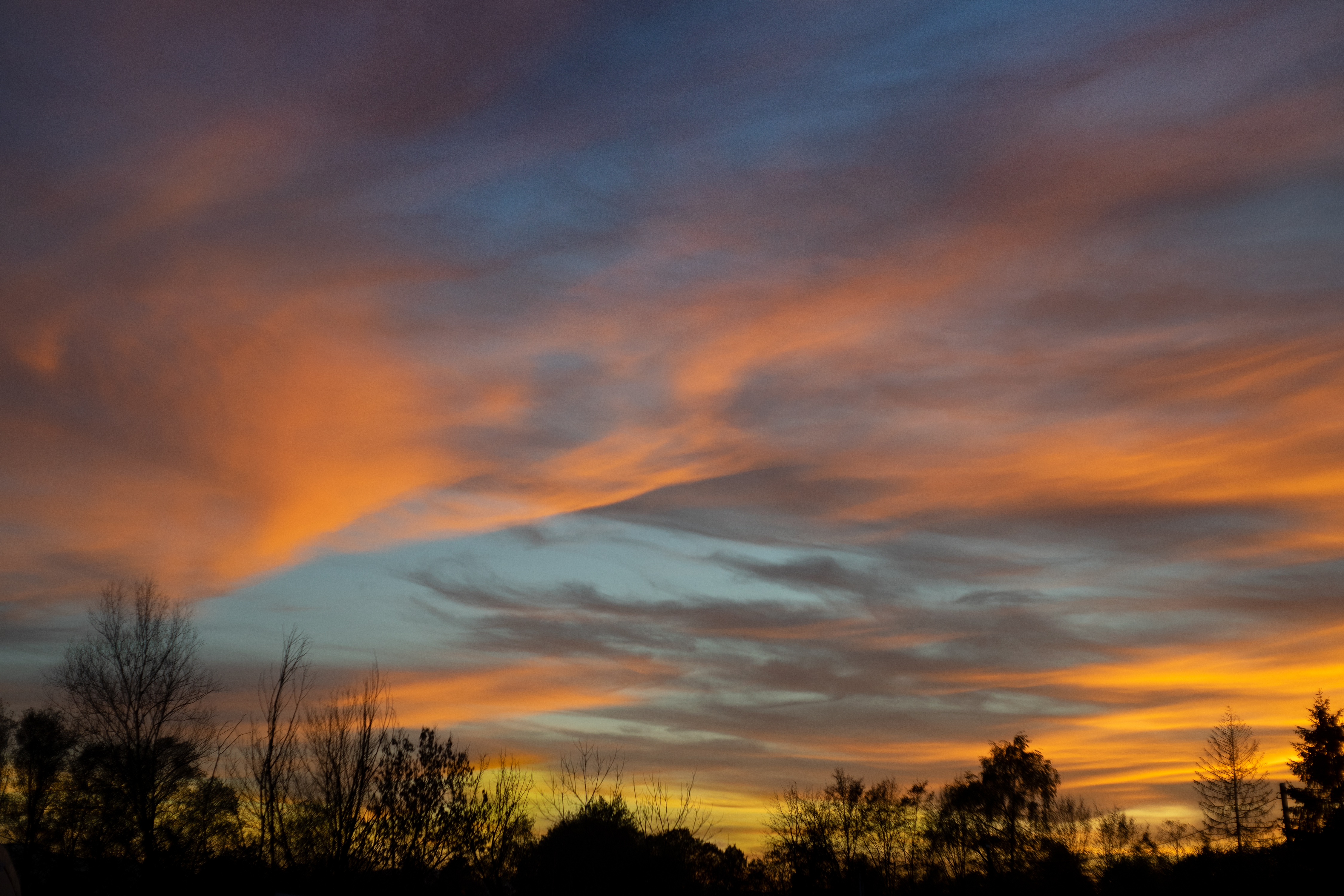 An image of a beatiful blue, red and orange sunset. Creative Commons